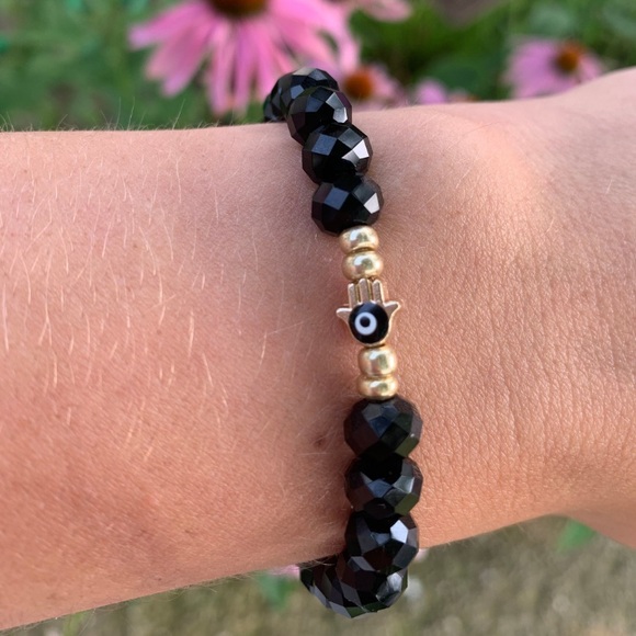 NWOT black crystal beaded evil eye elastic bracelet. - Picture 2 of 3